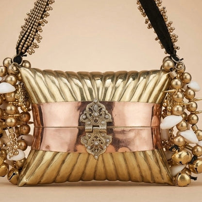 The Golden Cowrie Clutch